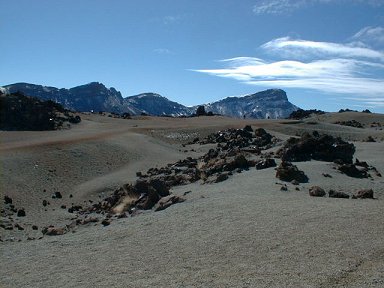 Gravel fields and distant ridge